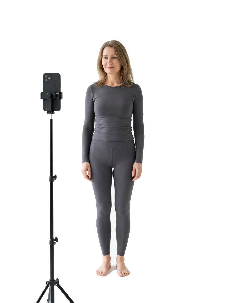 A woman being measured by her own phone camera
